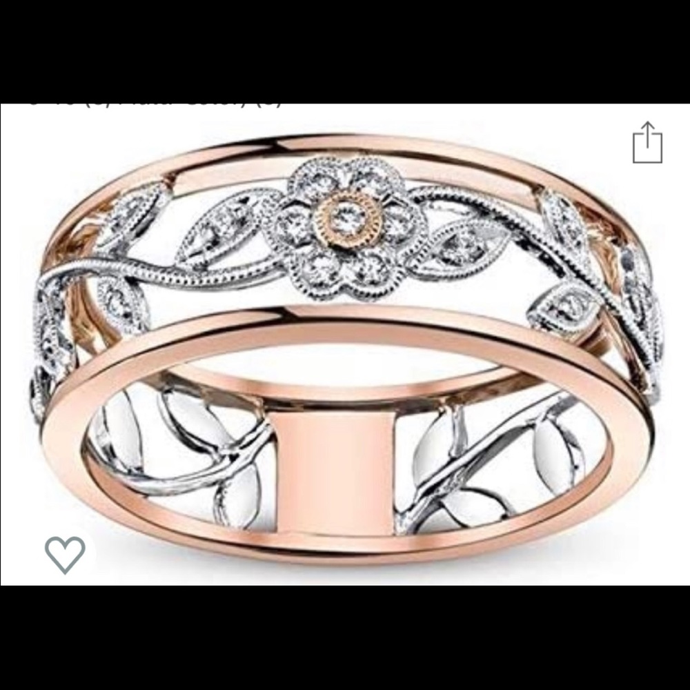 Woman’s silver and rose gold color floral band